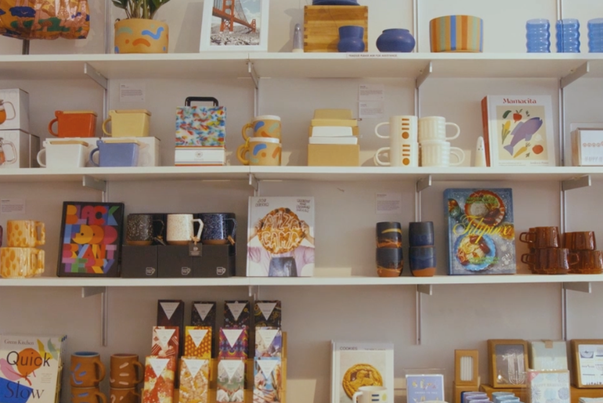 A retailer's shelves are shown fully stocked with Faire-sourced products