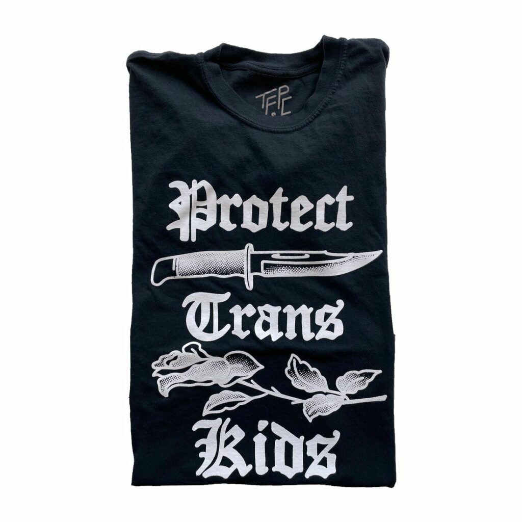 Protest Trans Kid shirt designed by Rio Wolf, printed by Transfigure Print Co.